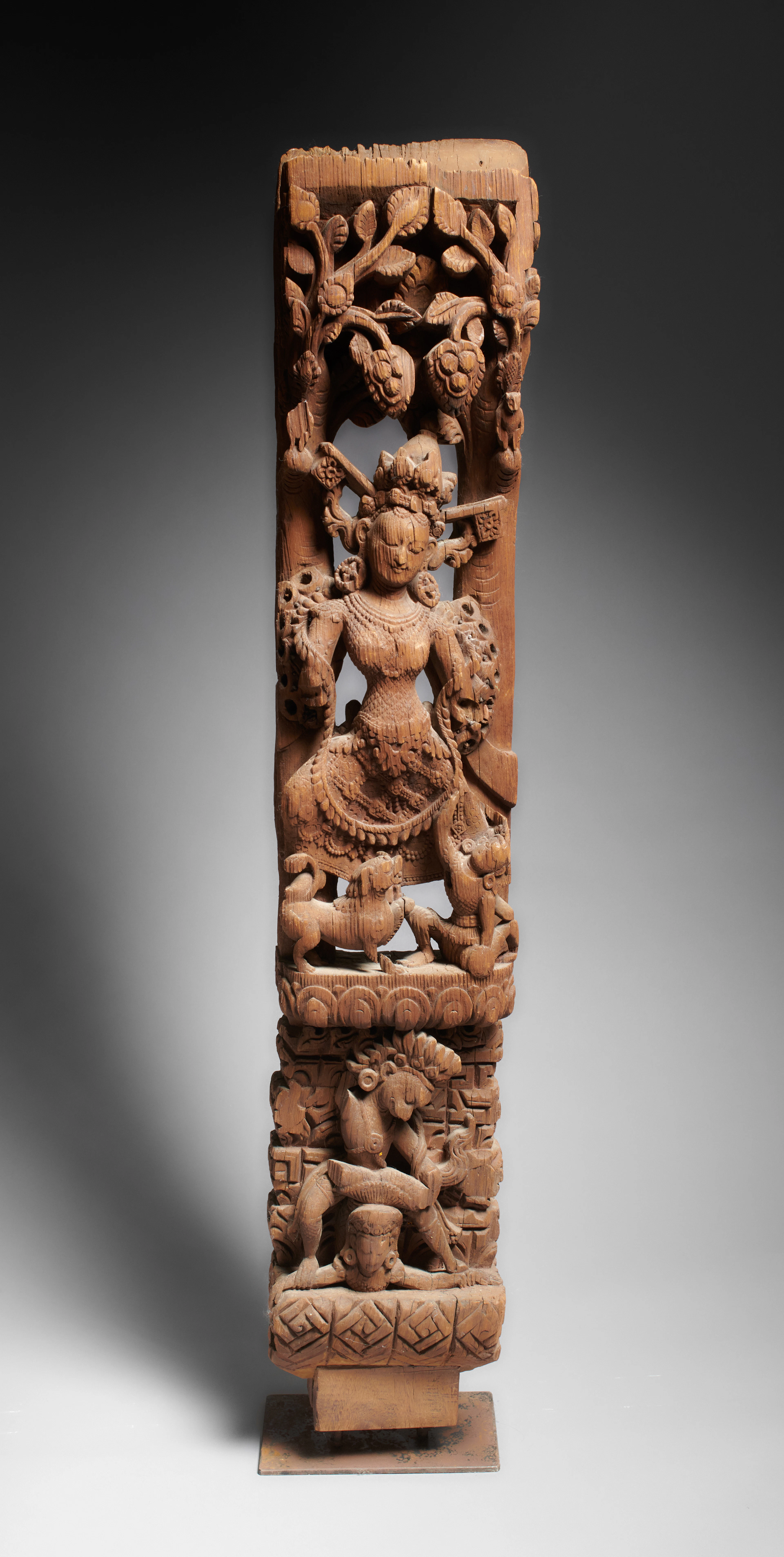 A Carved Wood Panel of Durga Combatting the Buffalo Demon (Mahishasuramardini)