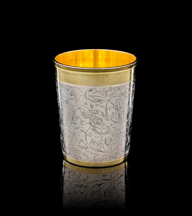 A German parcel-gilt silver beaker, Paul Solanier, Augsburg, 1697-1699