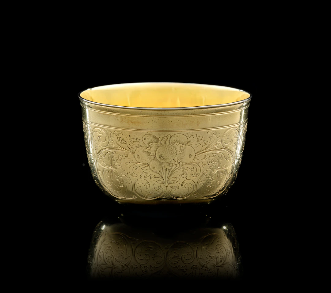 A German silver-gilt tumbler beaker, Peter II. Neuss, Augsburg, 1697-1699