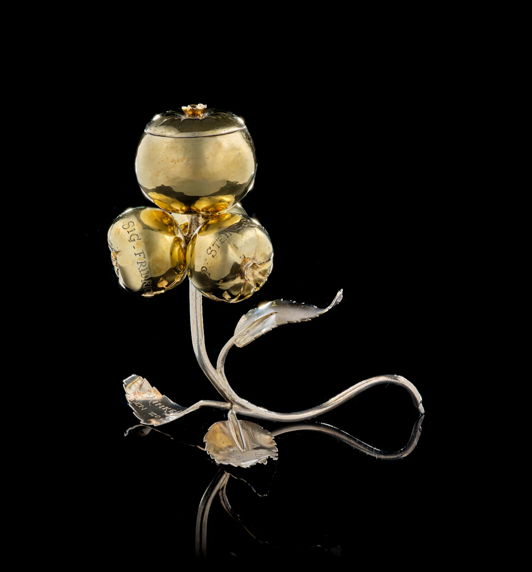 A Russian parcel-gilt silver family tree branch-shaped cup, David
