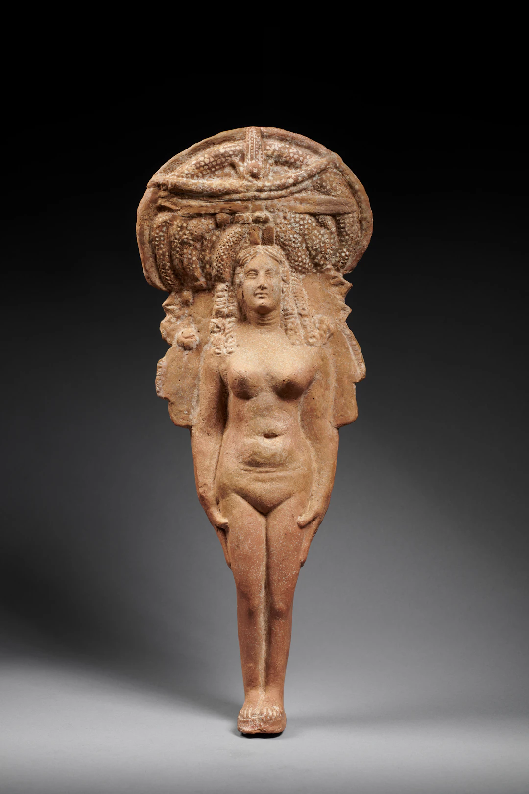 An Egyptian terracotta figure of Isis-Aphrodite