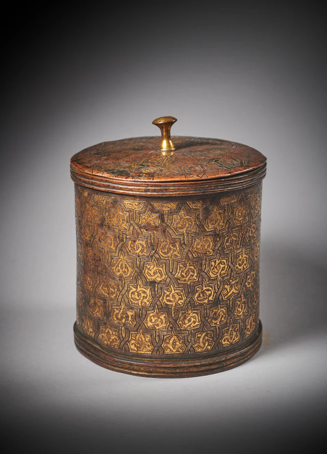 An Important Nasrid Gilt Copper-Alloy Pyxis