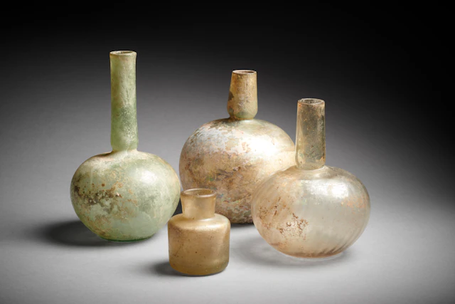 Four Islamic Glass Bottles