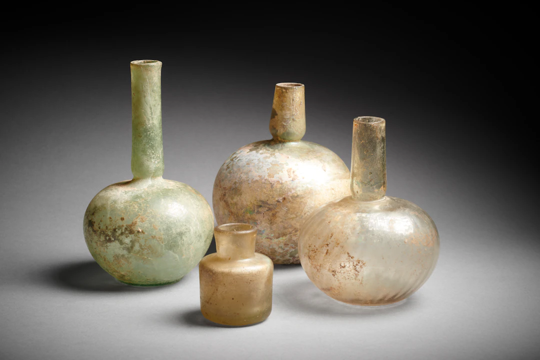 Four Islamic Glass Bottles