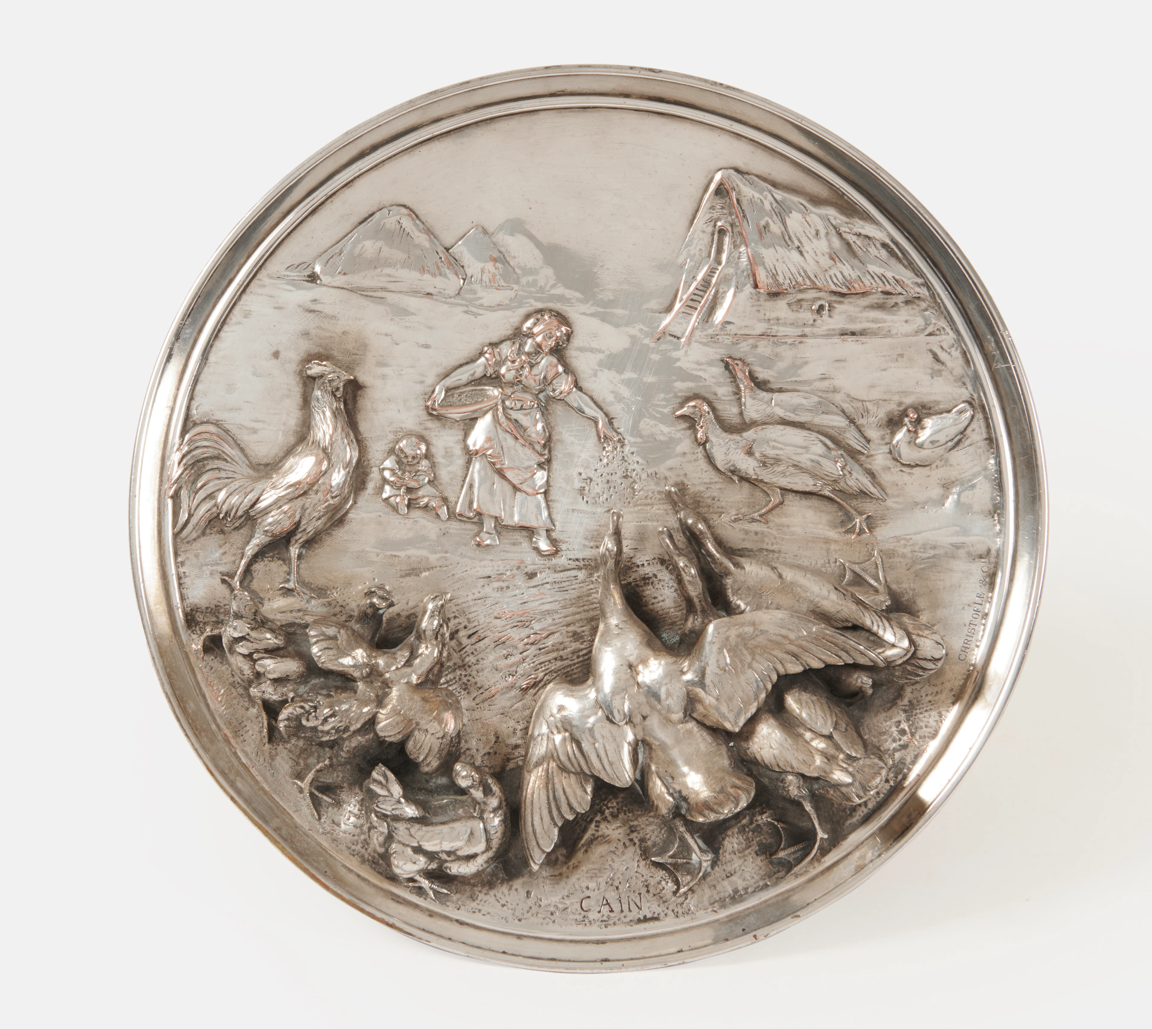 PLAT ROND EN BRONZE ARGENTÉ