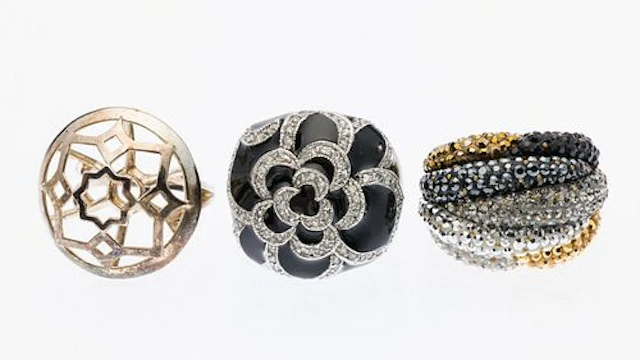 Three Gold and Sterling Rings, Including Tiffany