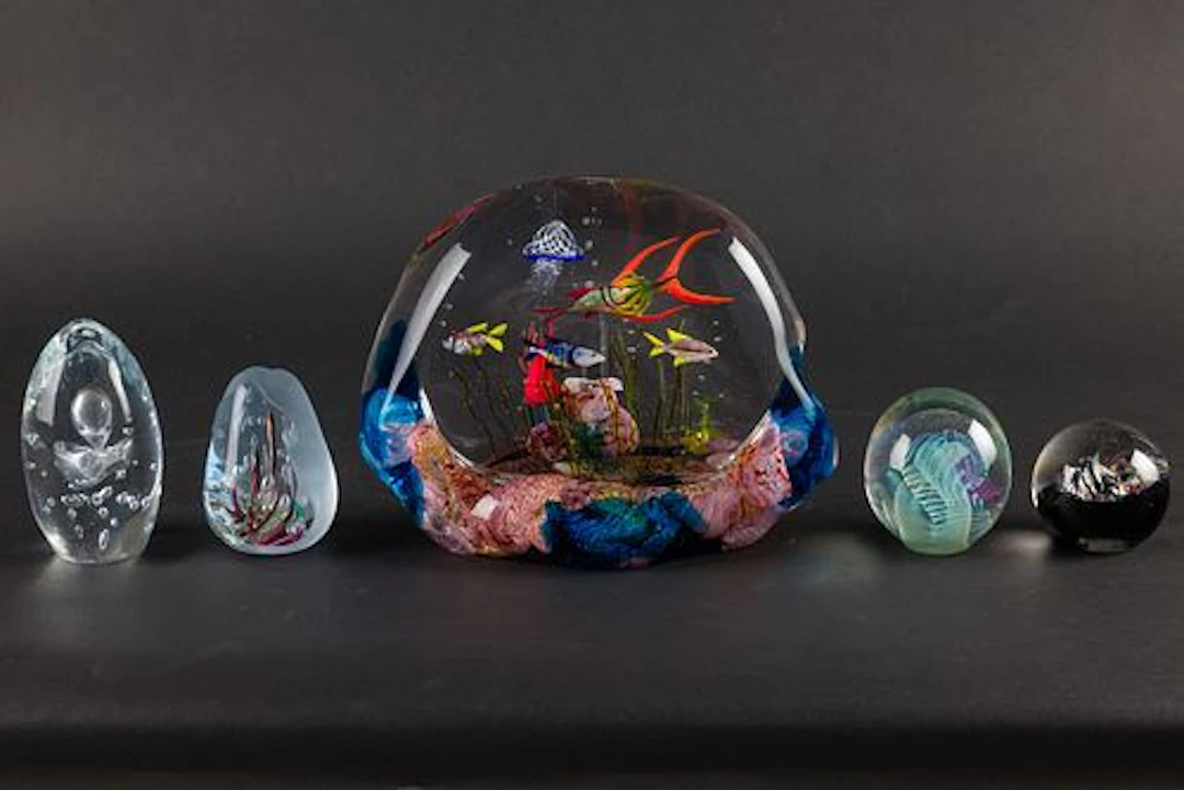 4 Art Glass Paperweights and a Fish Sculpture