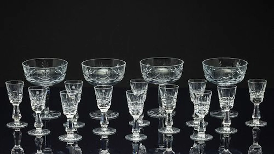 12 Waterford Cordials and 4 Lenox Champagnes