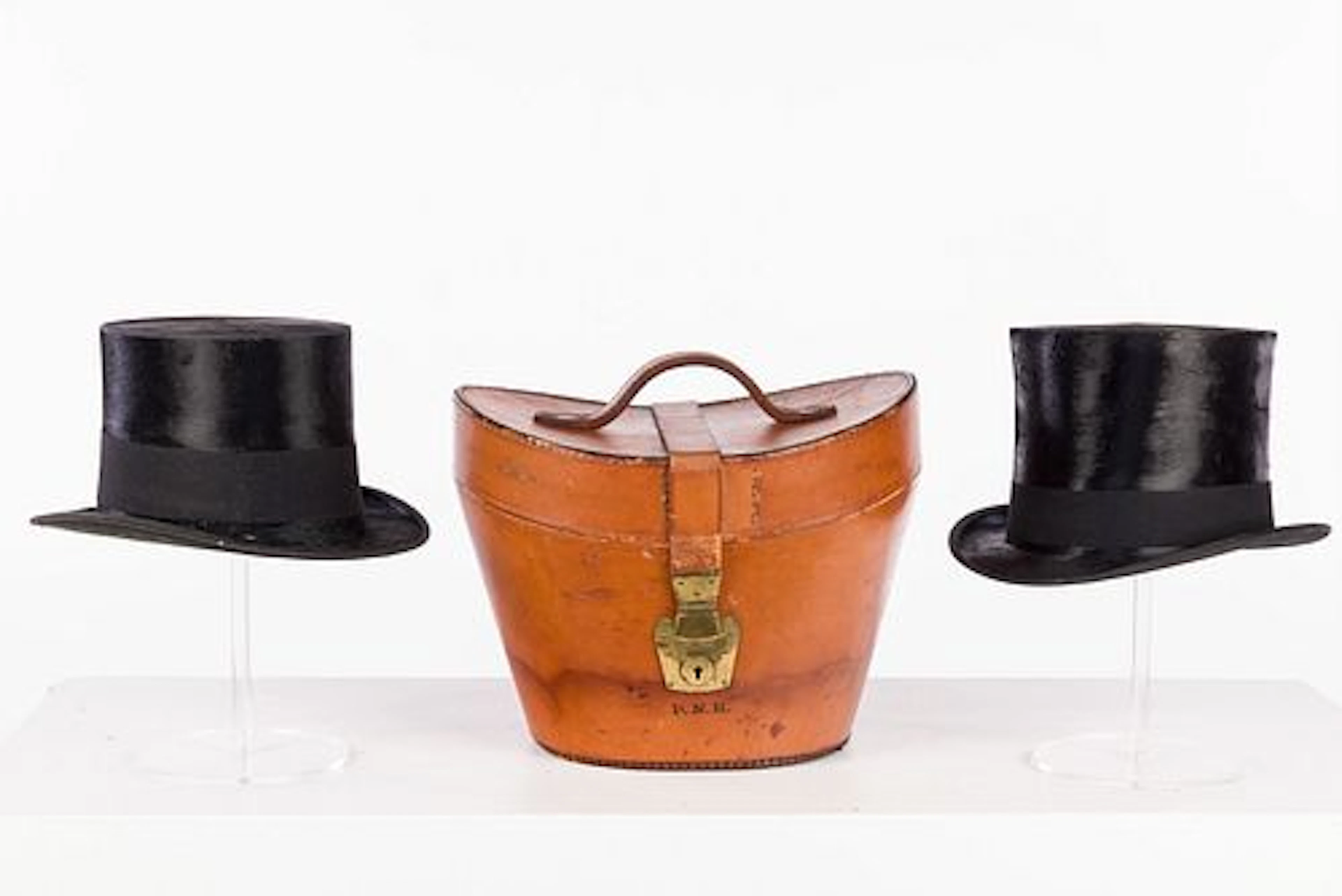 Two Silk Top Hats and a Leather Case
