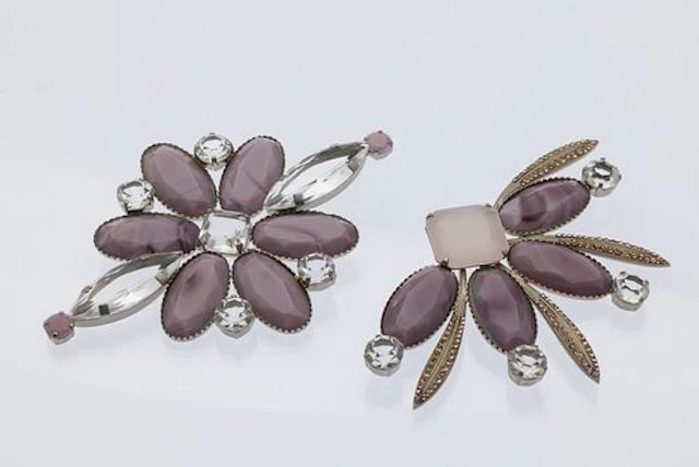 Two Giorgio Armani Brooches