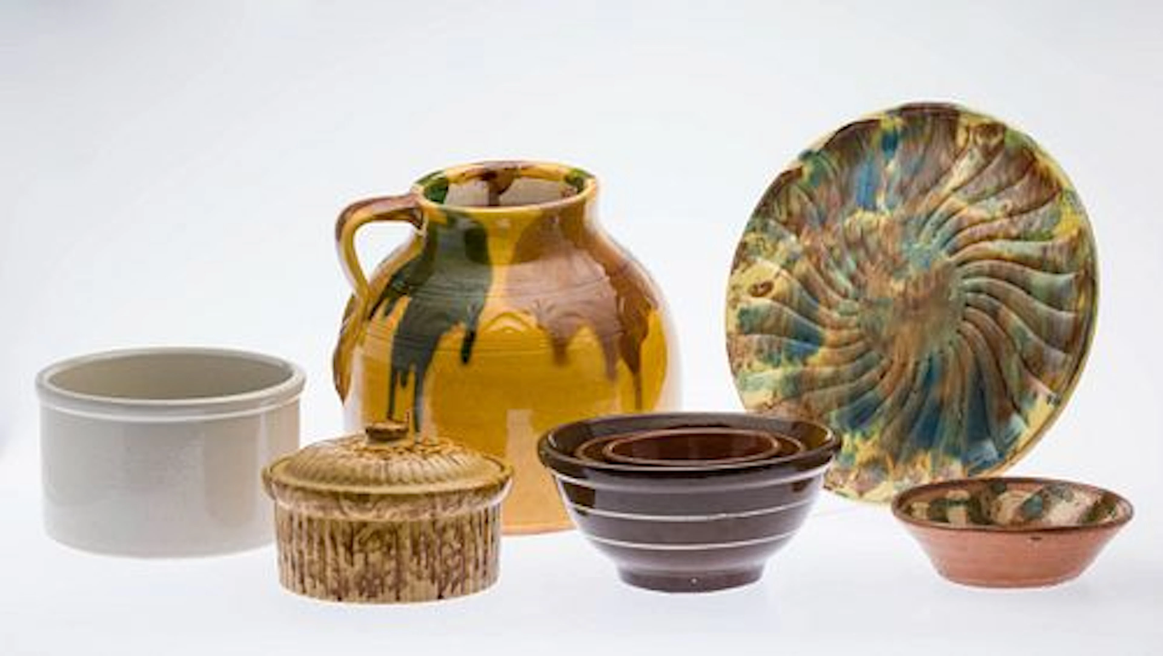 7 Ceramic Serving Articles and a Ceramic Jug