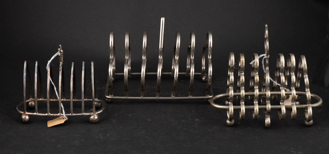 Three Antique Silver Plated Toast Racks