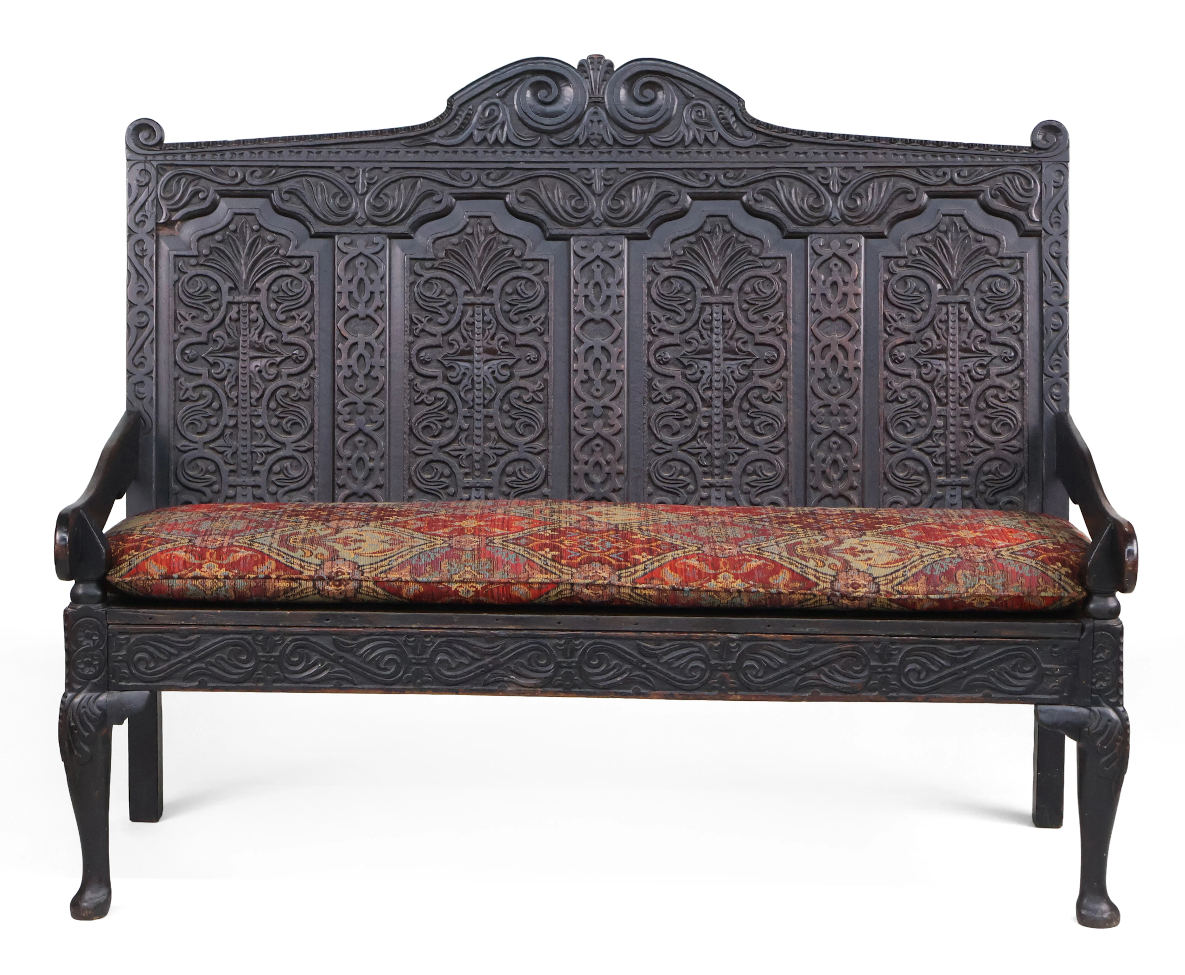 A Charles II Carved Oak Settee