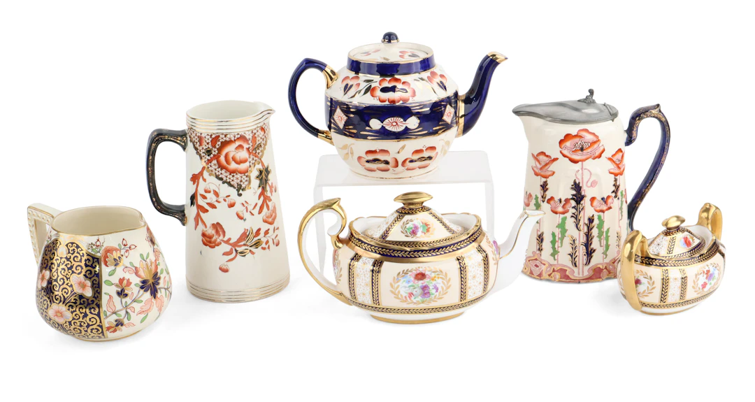 Six Imari Palette Pitchers, Teapots, and Sugar Bowl