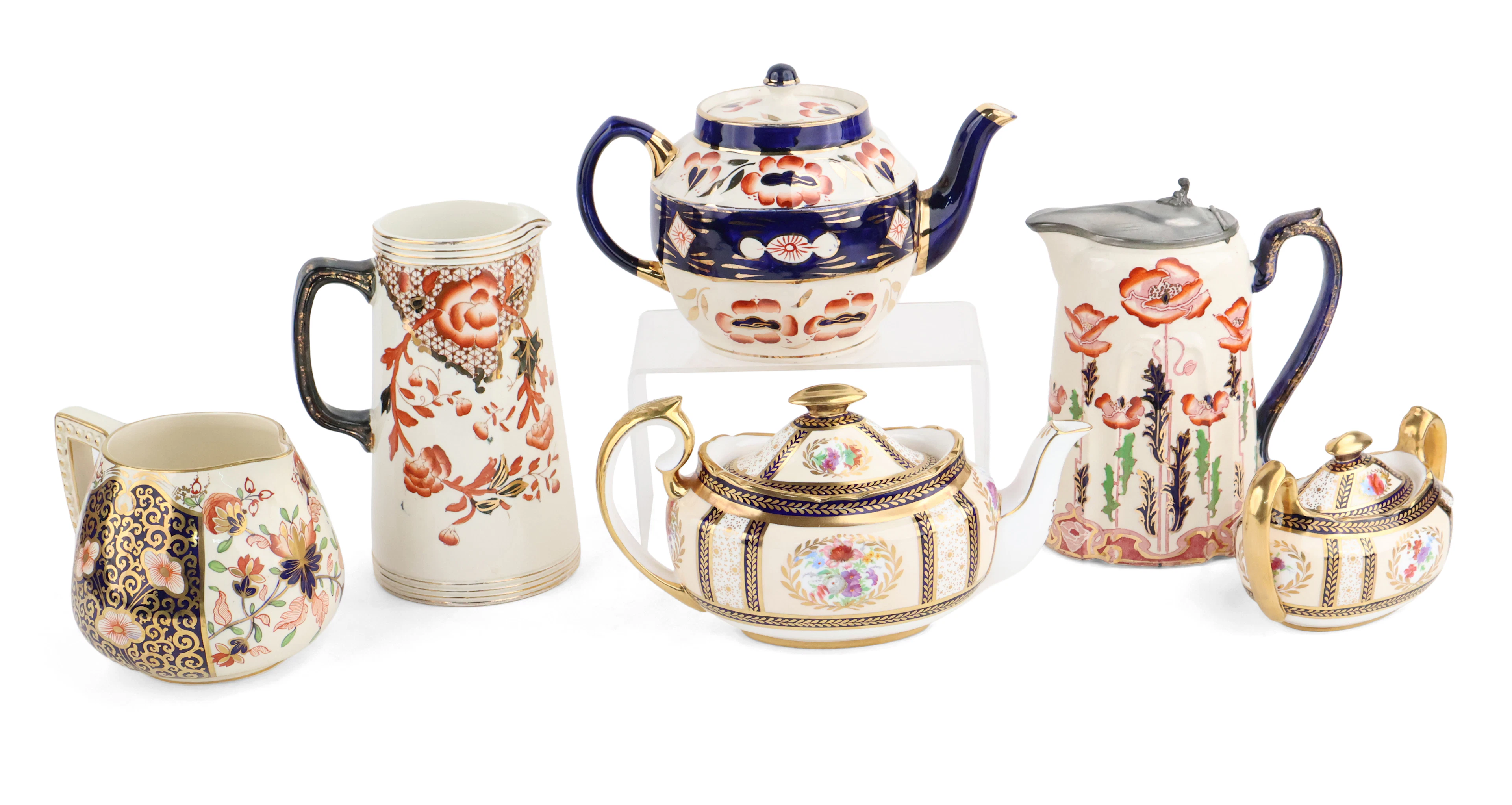 Six Imari Palette Pitchers, Teapots, and Sugar Bowl