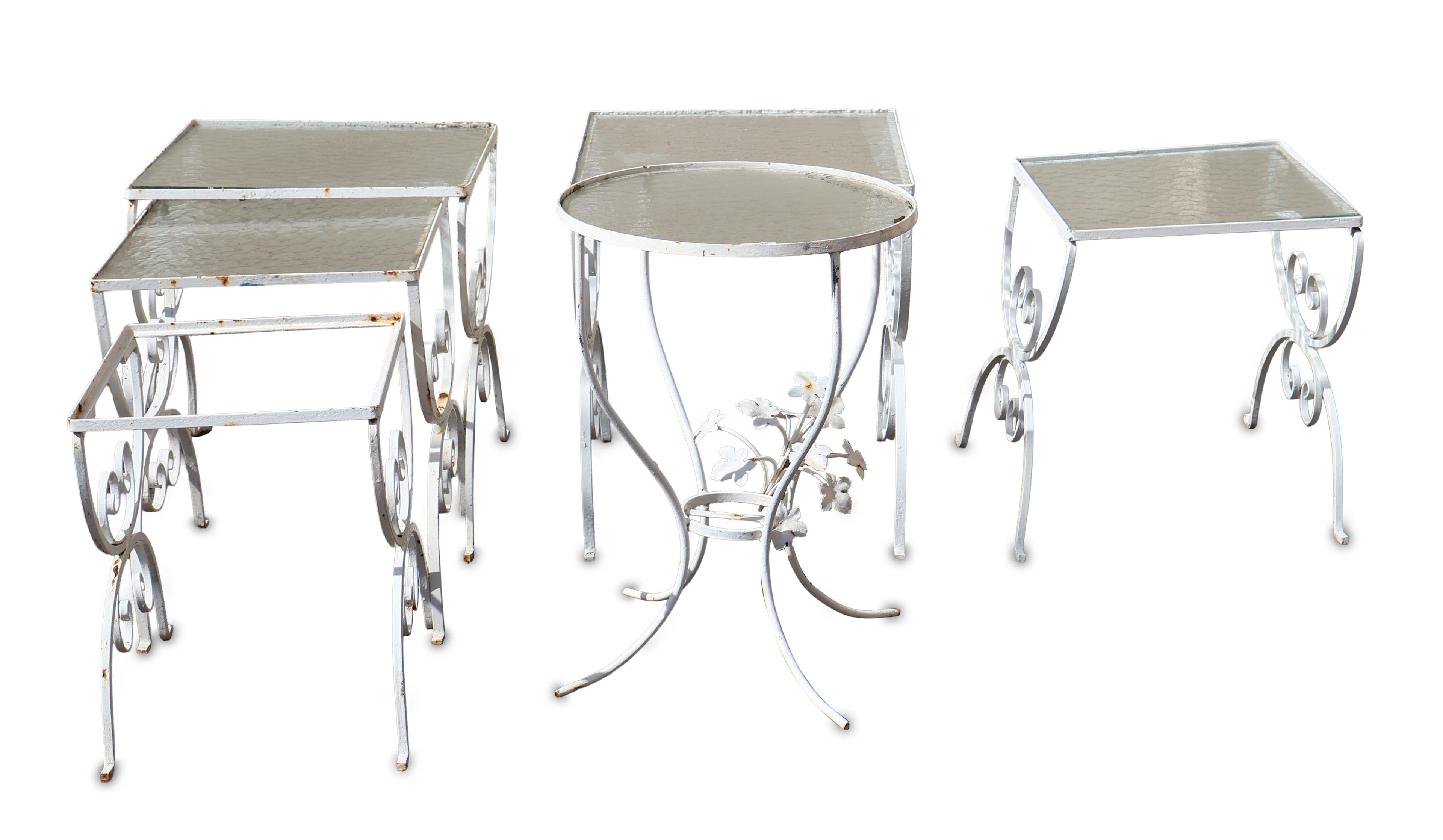 Seven Assorted White Painted Cast-Aluminum Outdoor Tables
