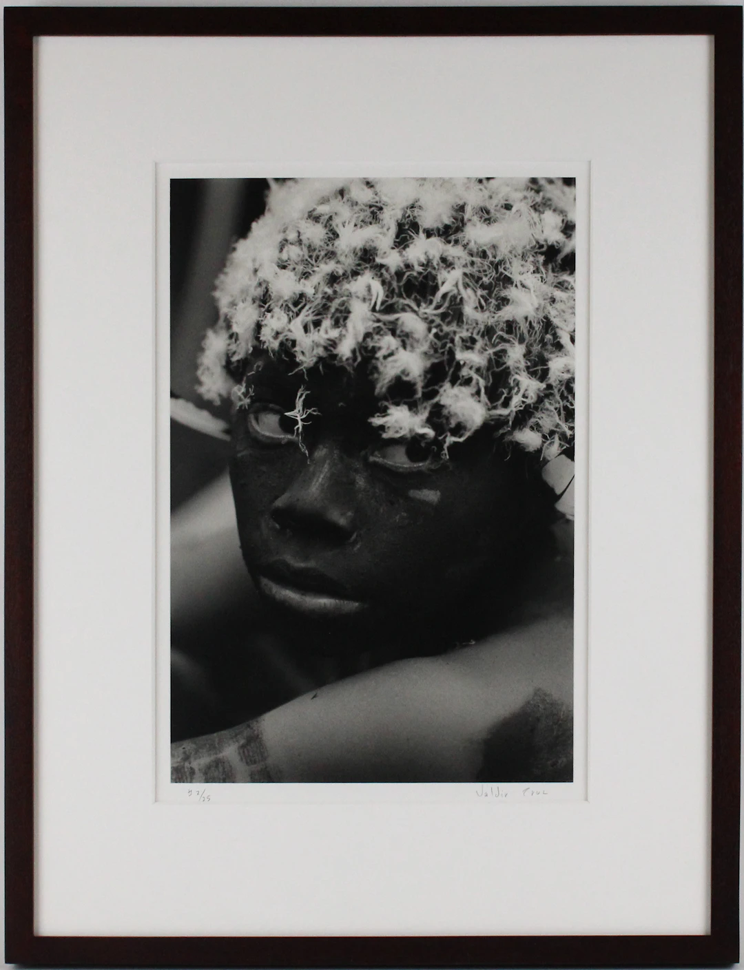 Valdir Cruz, Brazilian 1954-, Man with Painted Face and Buzzard Feather