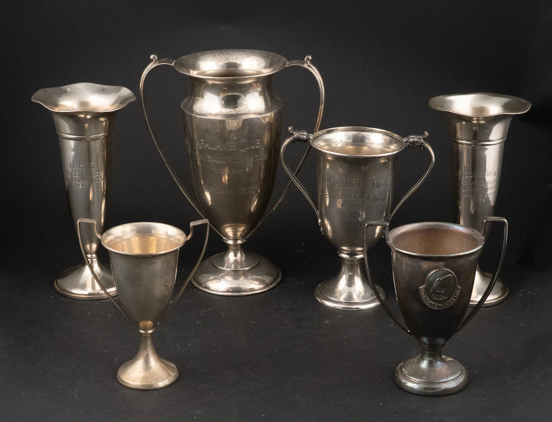 Four Sterling Silver Trophies