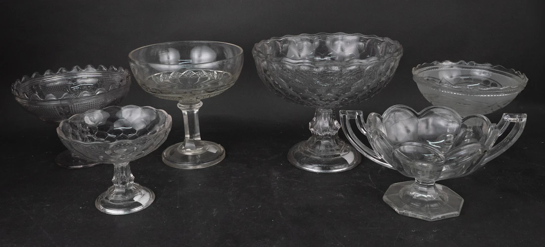 Six Colorless Glass Compotes