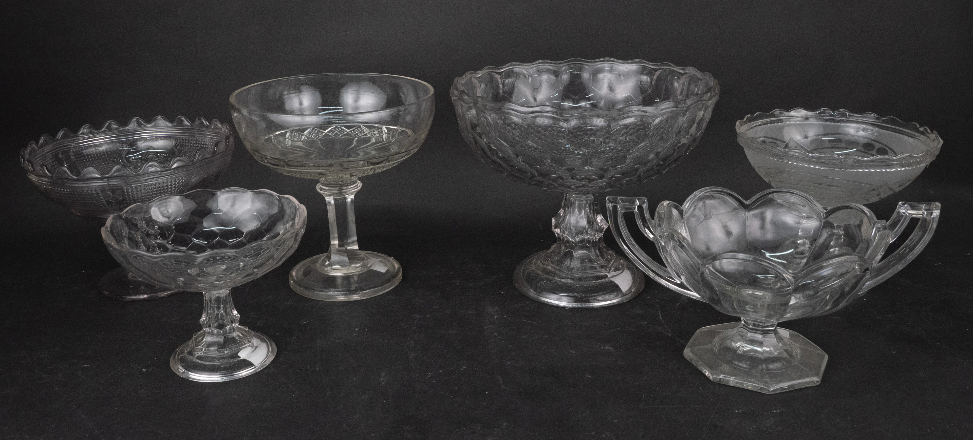 Six Colorless Glass Compotes