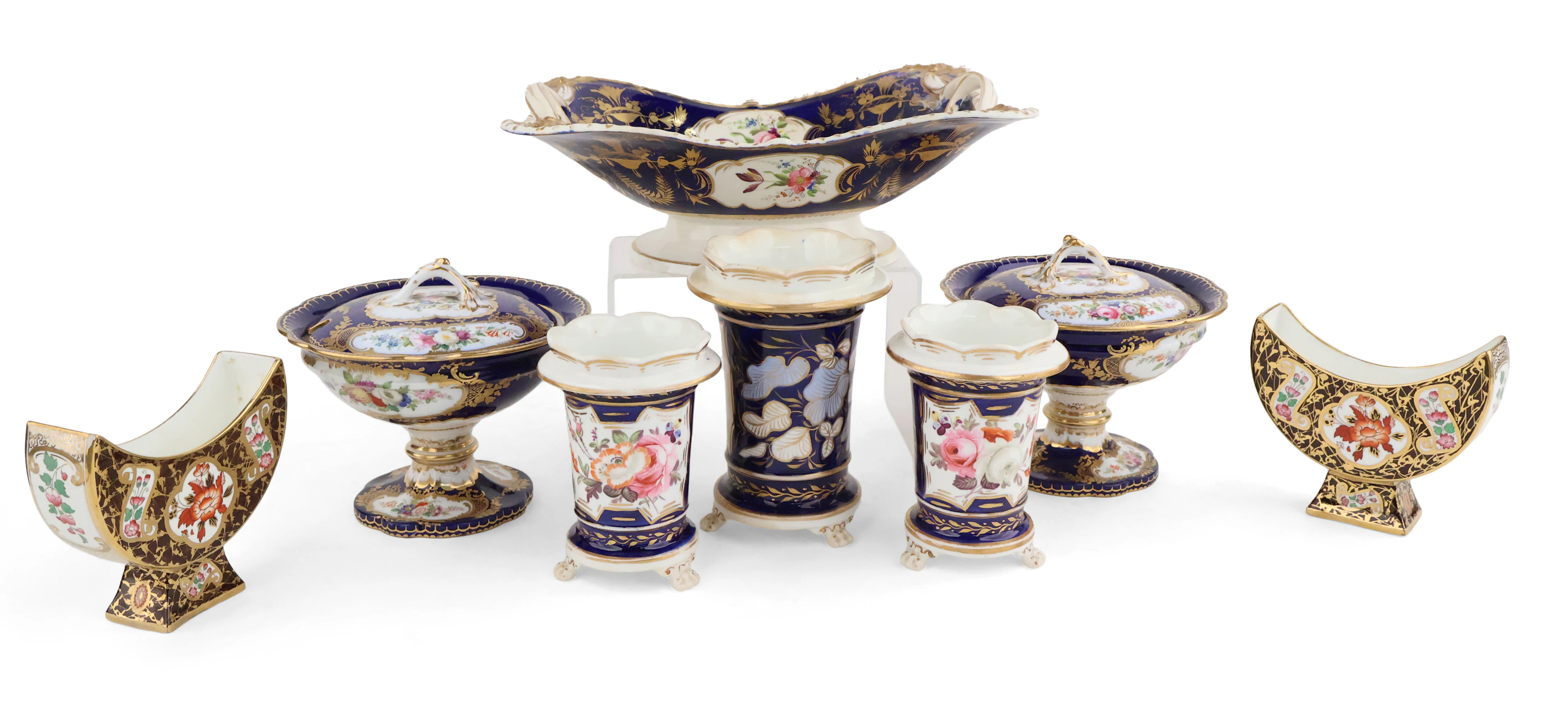 Eight Cobalt and Gilt Porcelain Table Articles