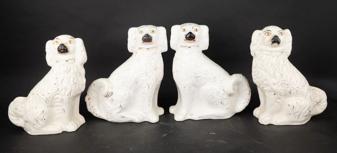 Four Staffordshire White Spaniels