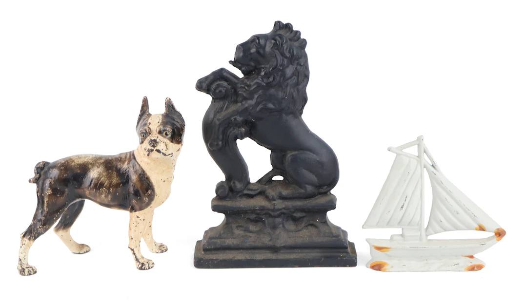 Three Painted Cast Iron Doorstops