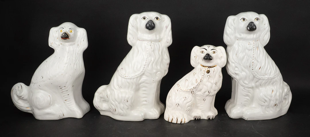 Four Staffordshire White Spaniels