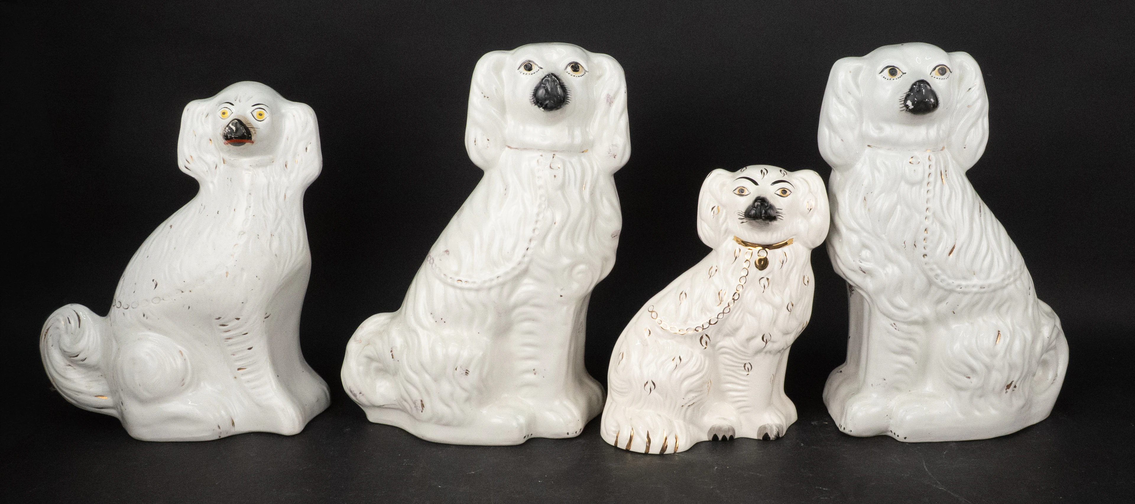 Four Staffordshire White Spaniels