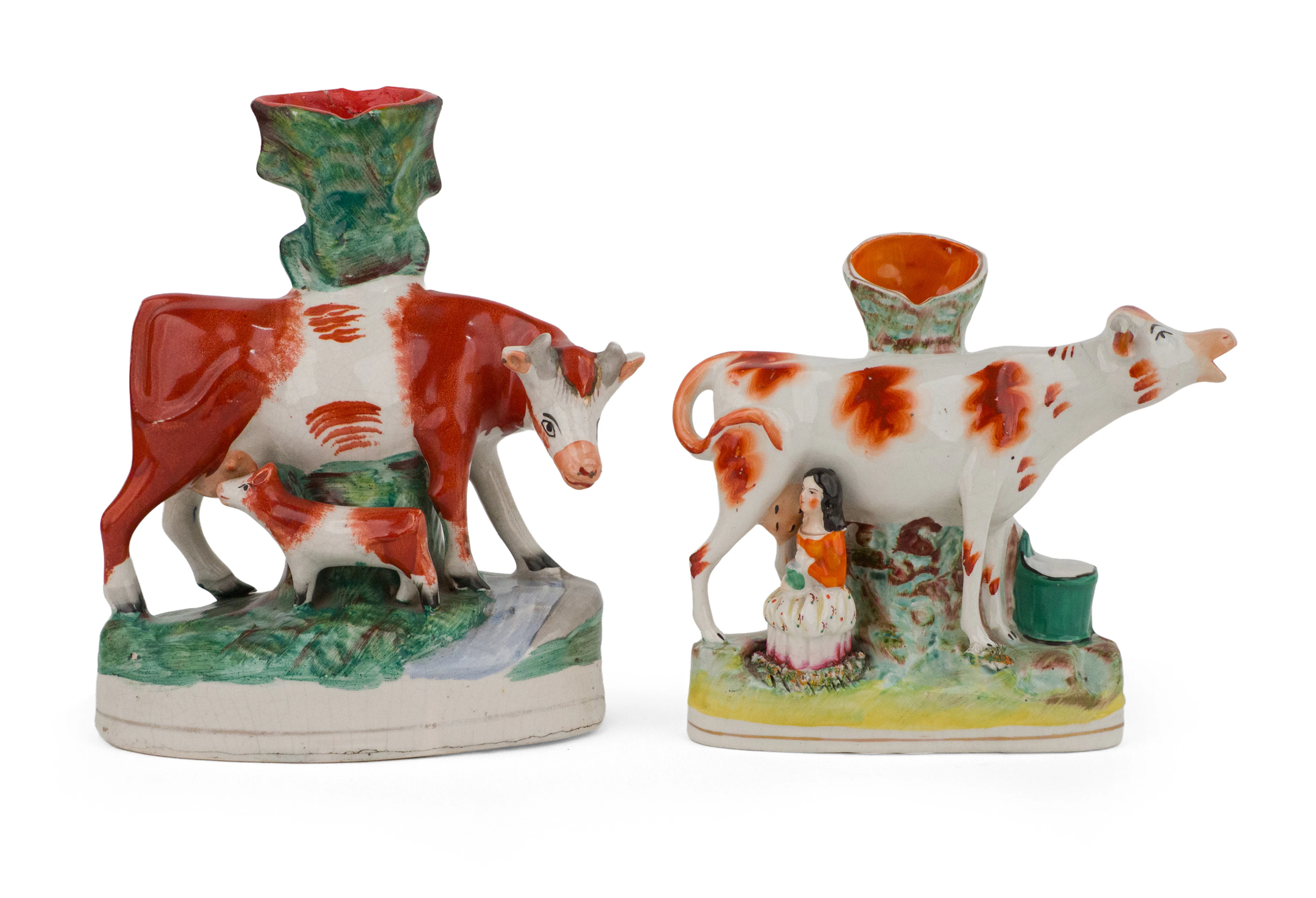 Two Staffordshire Cow Spill Vases