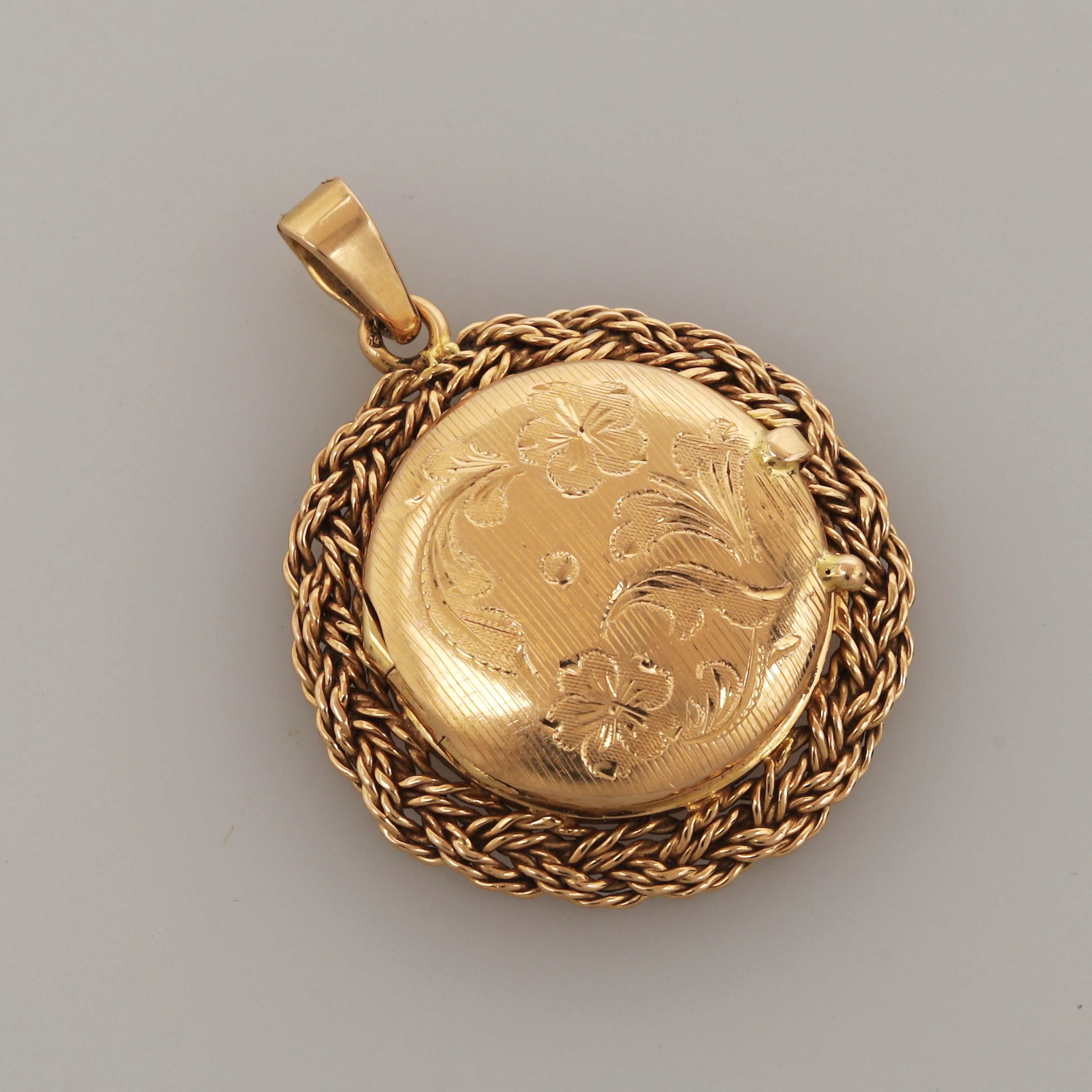 HÄNGE MED FOTOGÖMMA, guld 18k, vikt 6,83 gram.