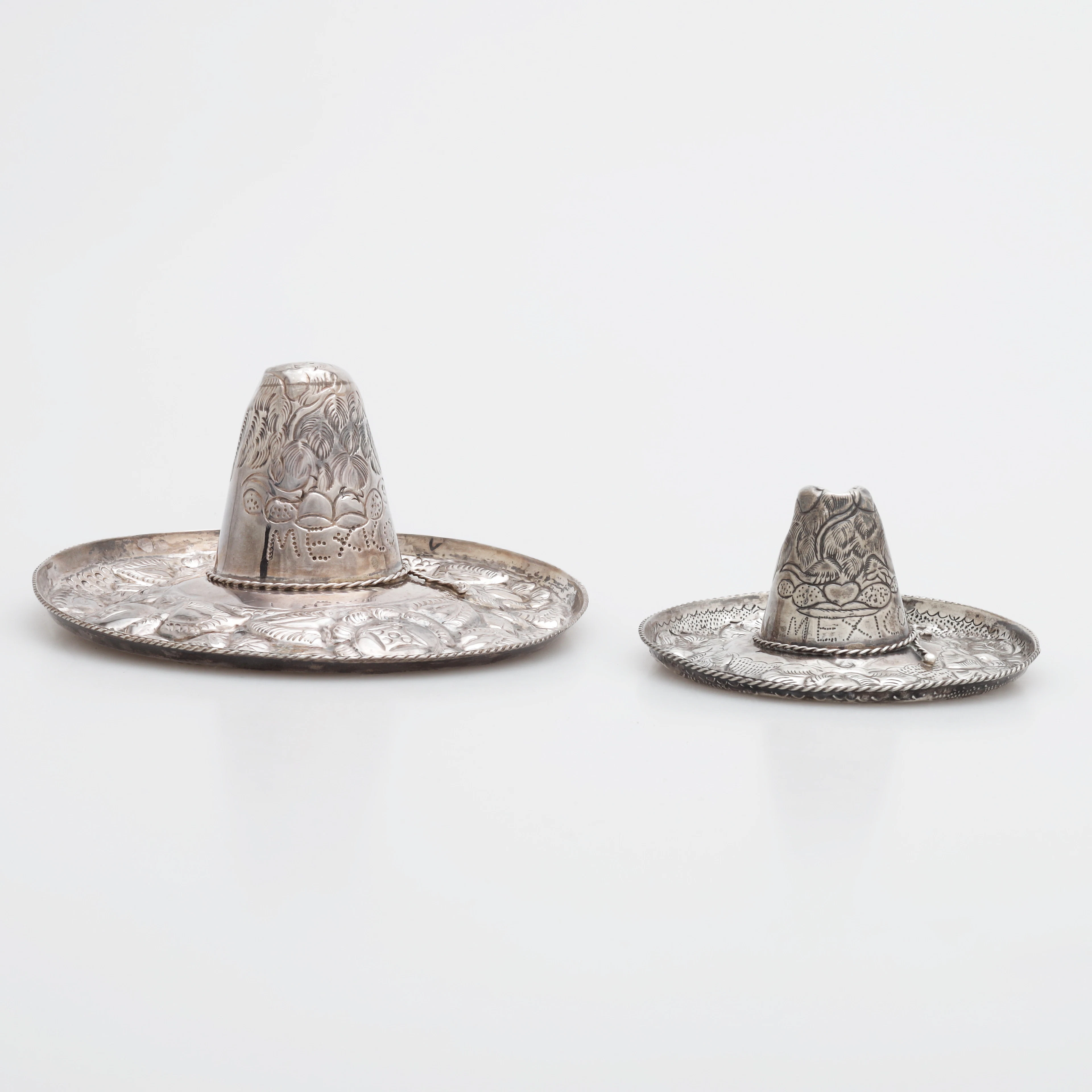 SKULPTURER, 2 st, sterlingsilver, sombreros, totalvikt 94 gram.