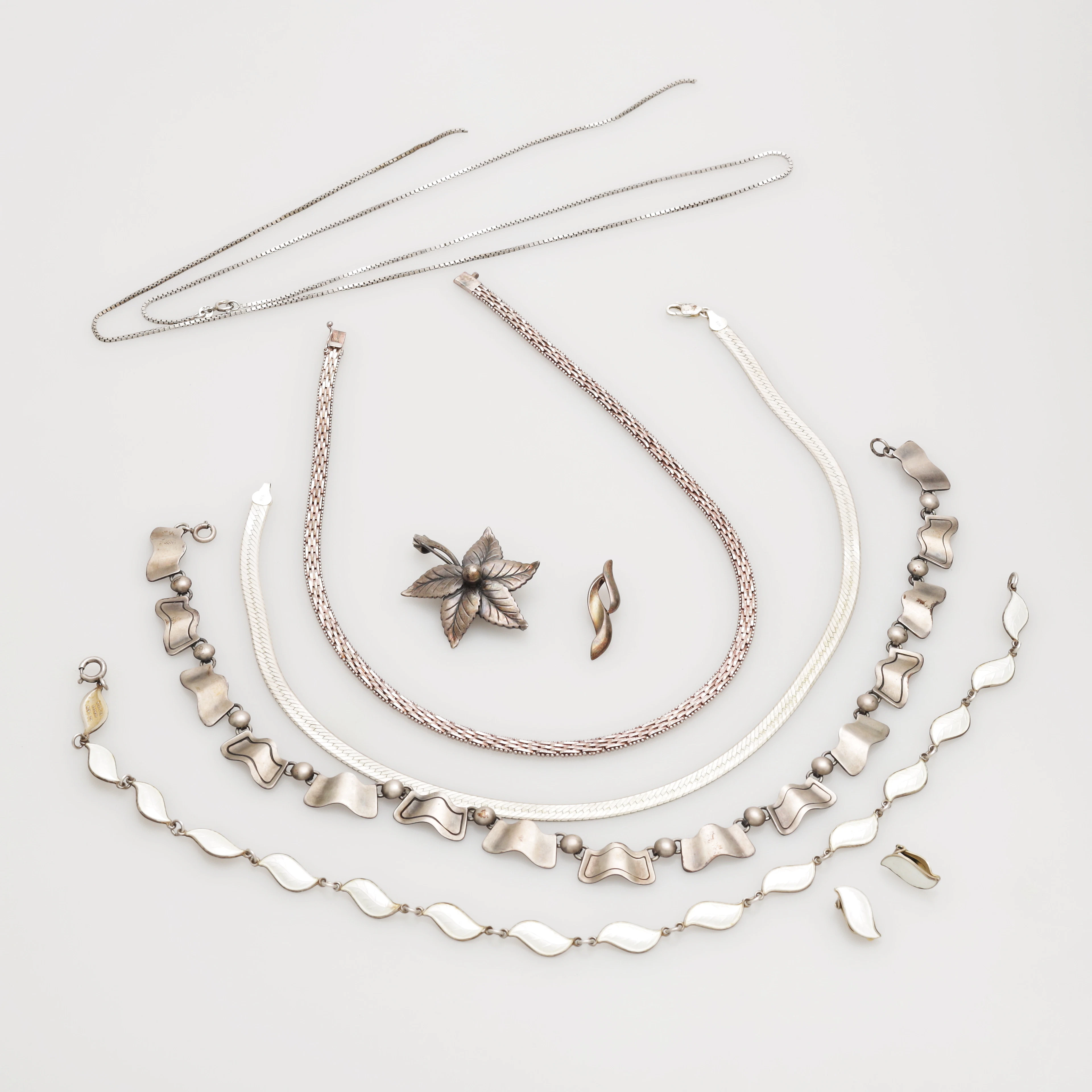 SMYCKEN, silver, 9 delar, vikt 102 gram.