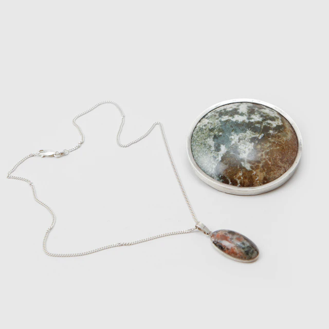 BROSCH, silver, kolmårdsmarmor, Claes Emil Andrén, Göteborg, 1909.
