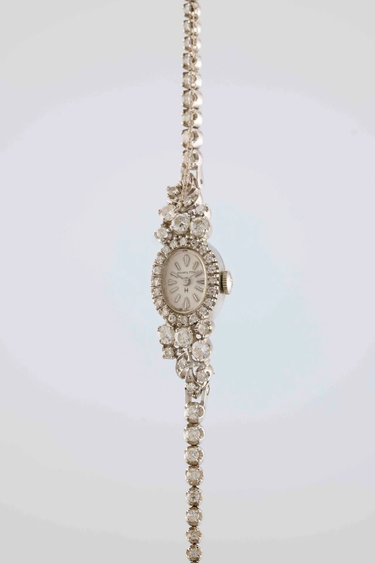 HAMILTON Cocktail watch. Circa: 1980. Case: round in 585/1000 white