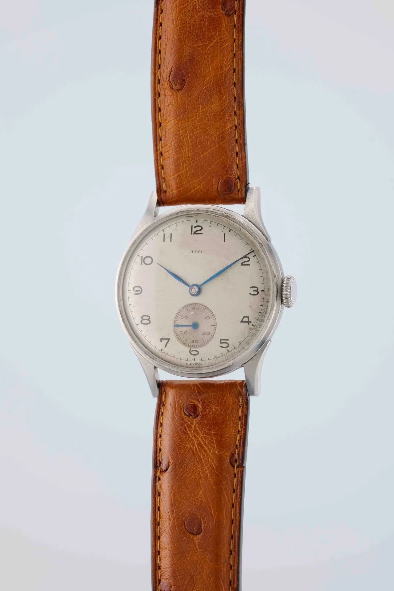 ATO Circa: 1950. Case: round steel, smooth bezel, fluted winding mechanism