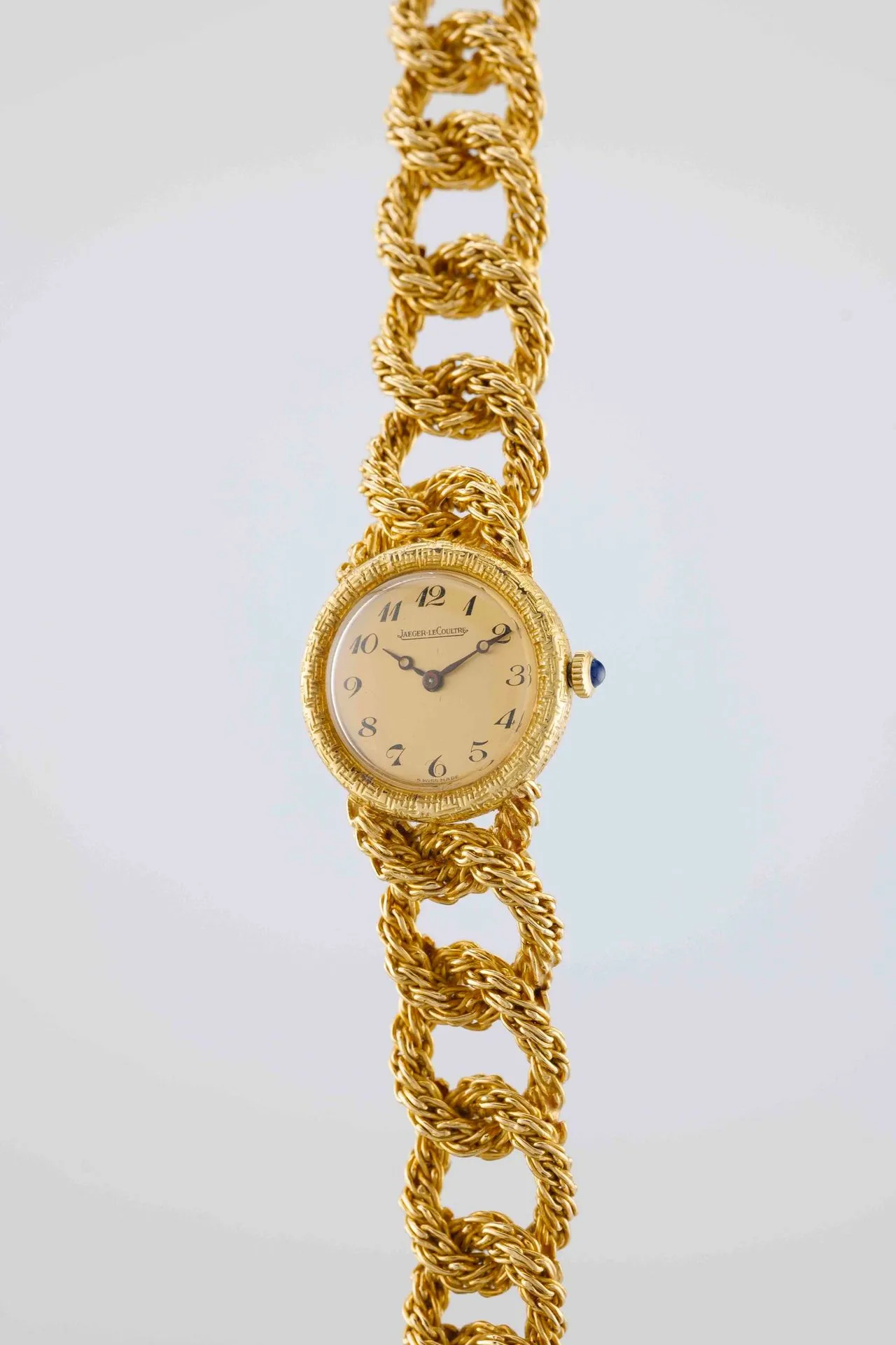JAEGER-LECOULTRE Evening Watch. Circa: 1950. Case: round in 750/1000