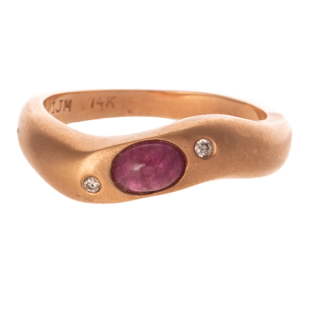 A Modern Ruby Cabochon & Diamond Ring in 14K