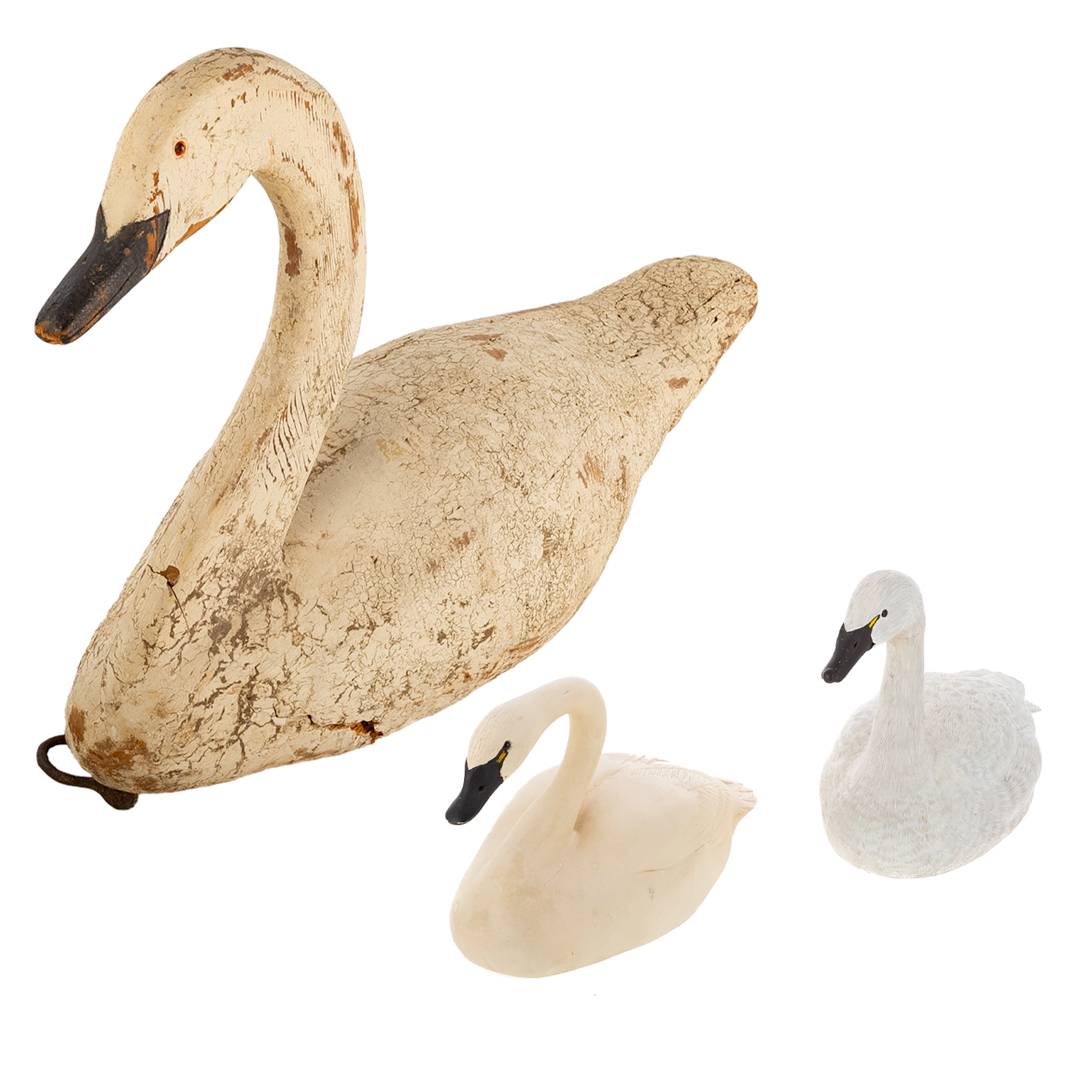 A Large Carved Decoy Swan with Two Small Swans