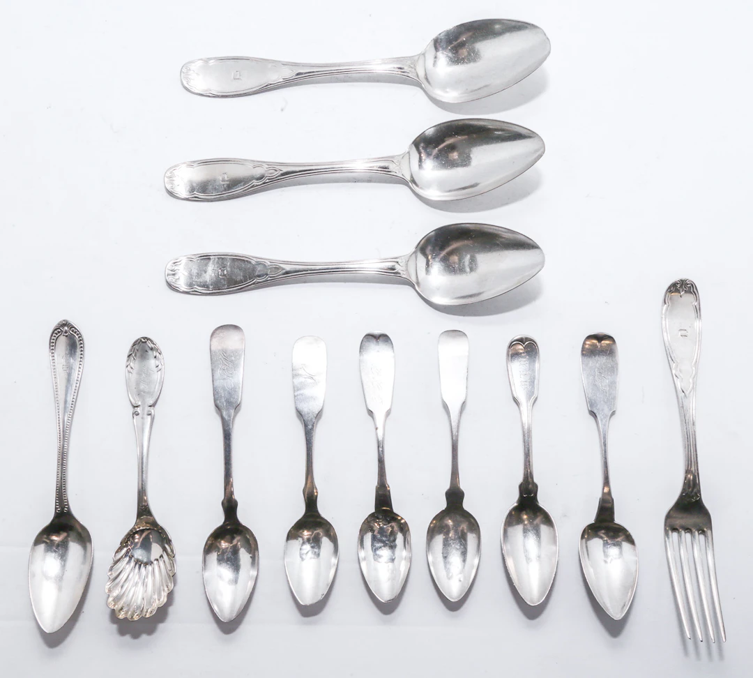 11 New York Coin Silver Spoons & One Fork