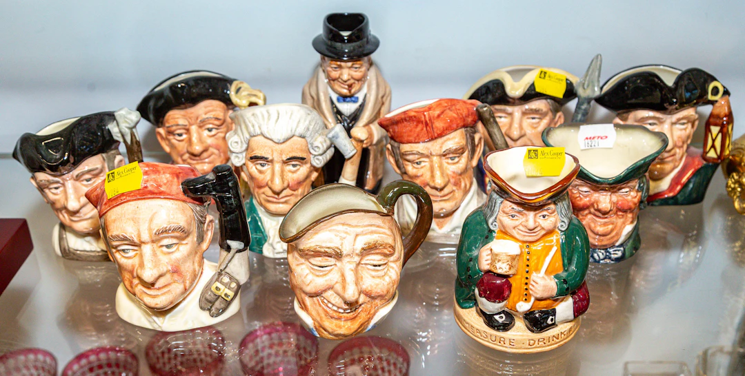 A Collection of Small Royal Doulton Character Jugs