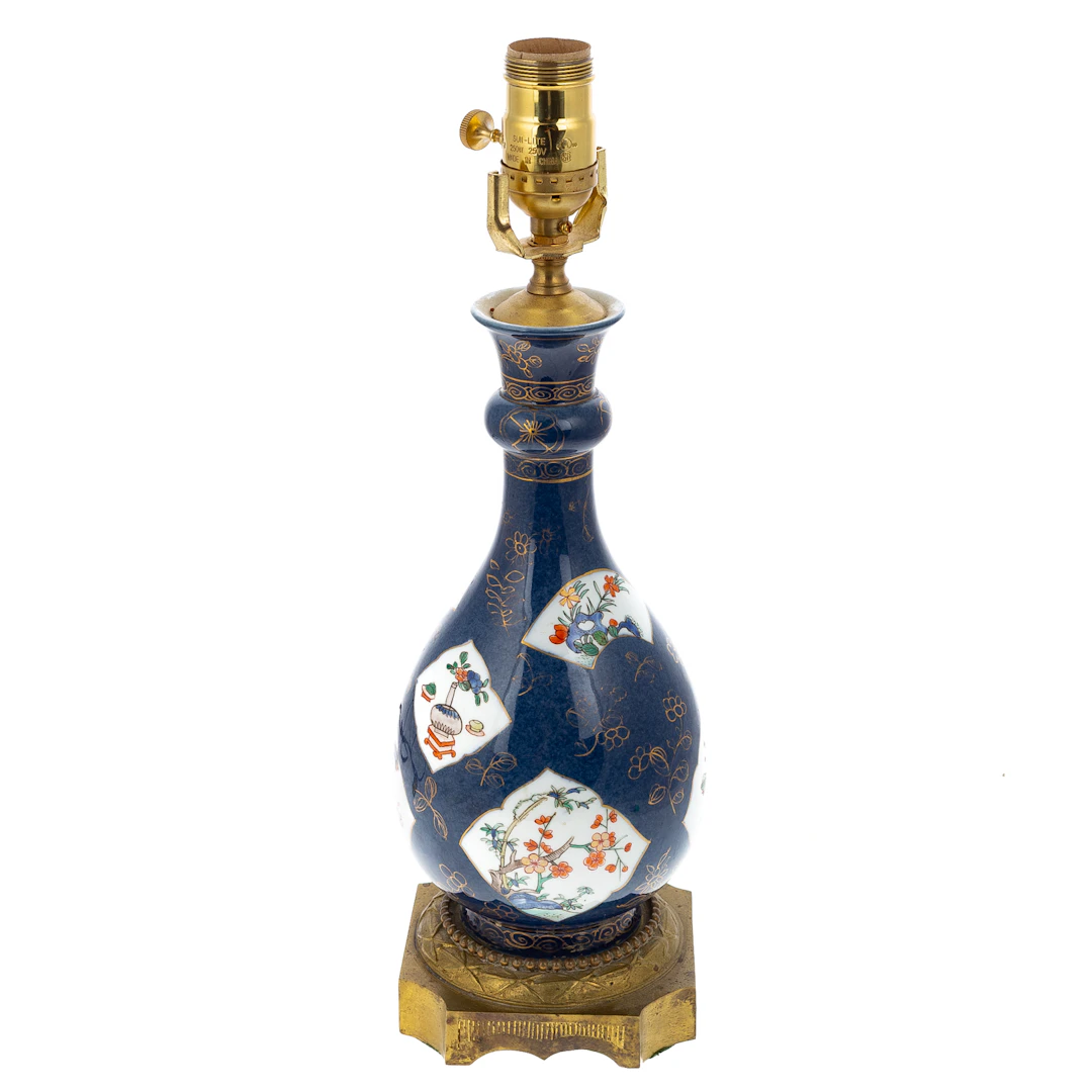 A Chinese Blue Ground Famille Verte Vase