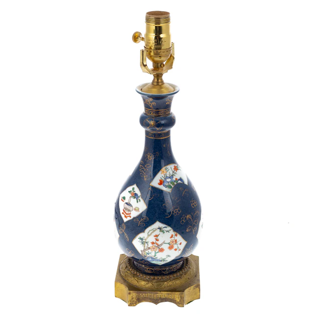 A Chinese Blue Ground Famille Verte Vase
