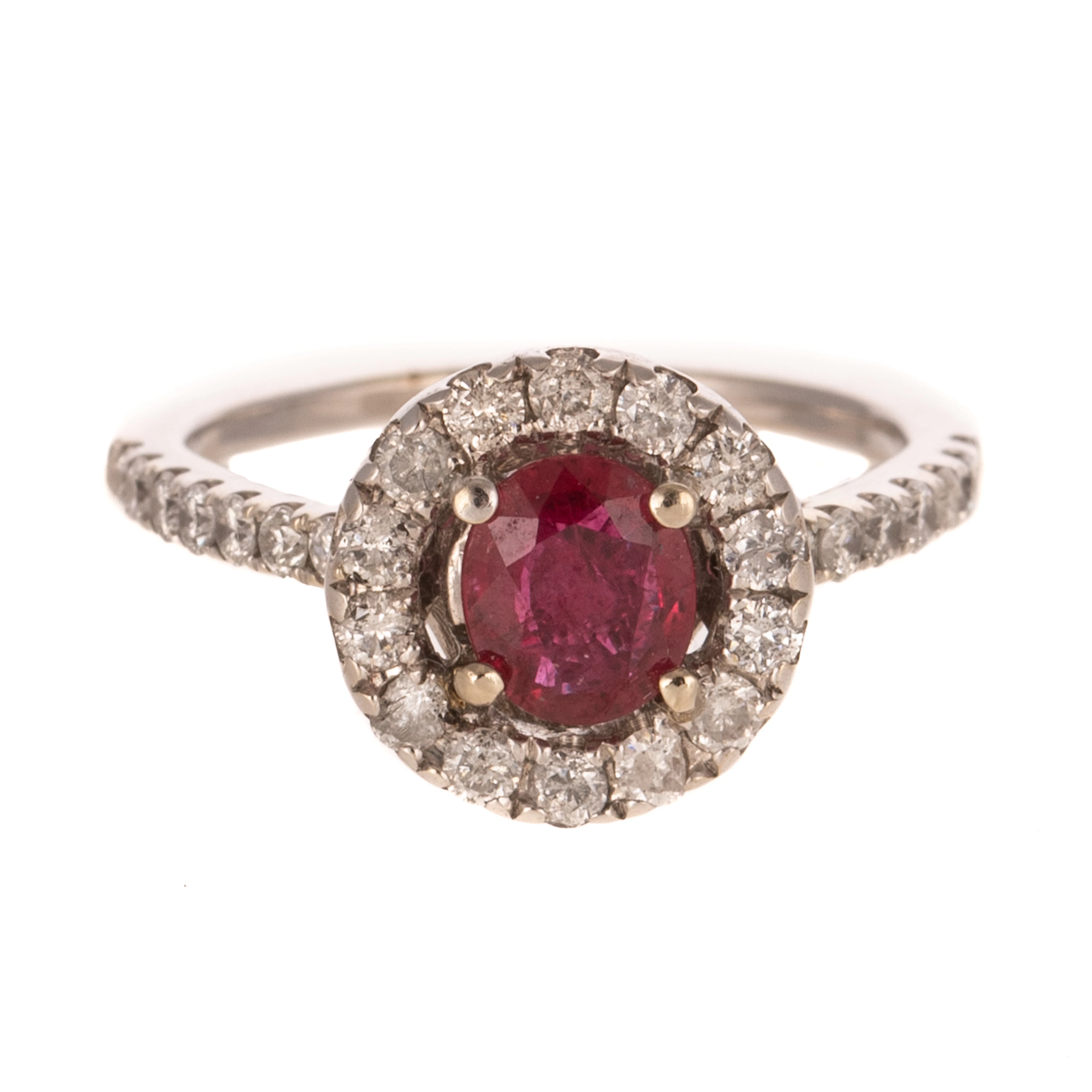 A Ruby & Diamond Halo Ring in 14K