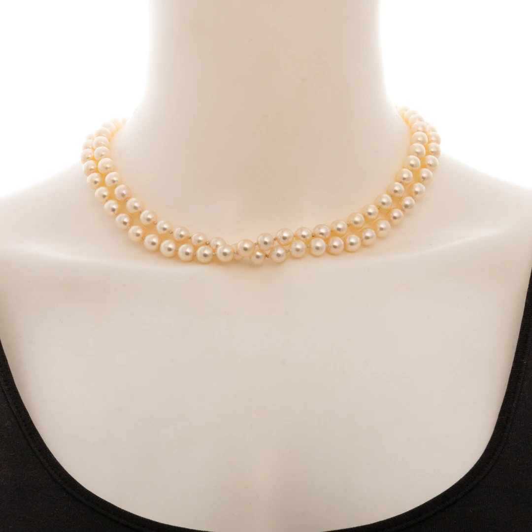 An Opera Length Strand of 7 - 7.5 mm Pearls