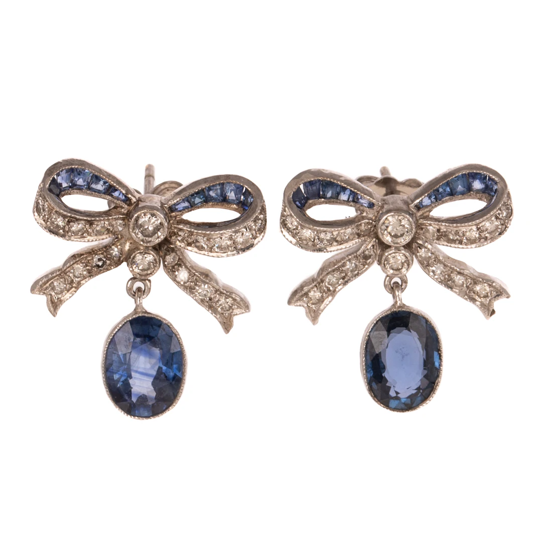 A Pair of Sapphire & Diamond Bow Earrings in Platinum