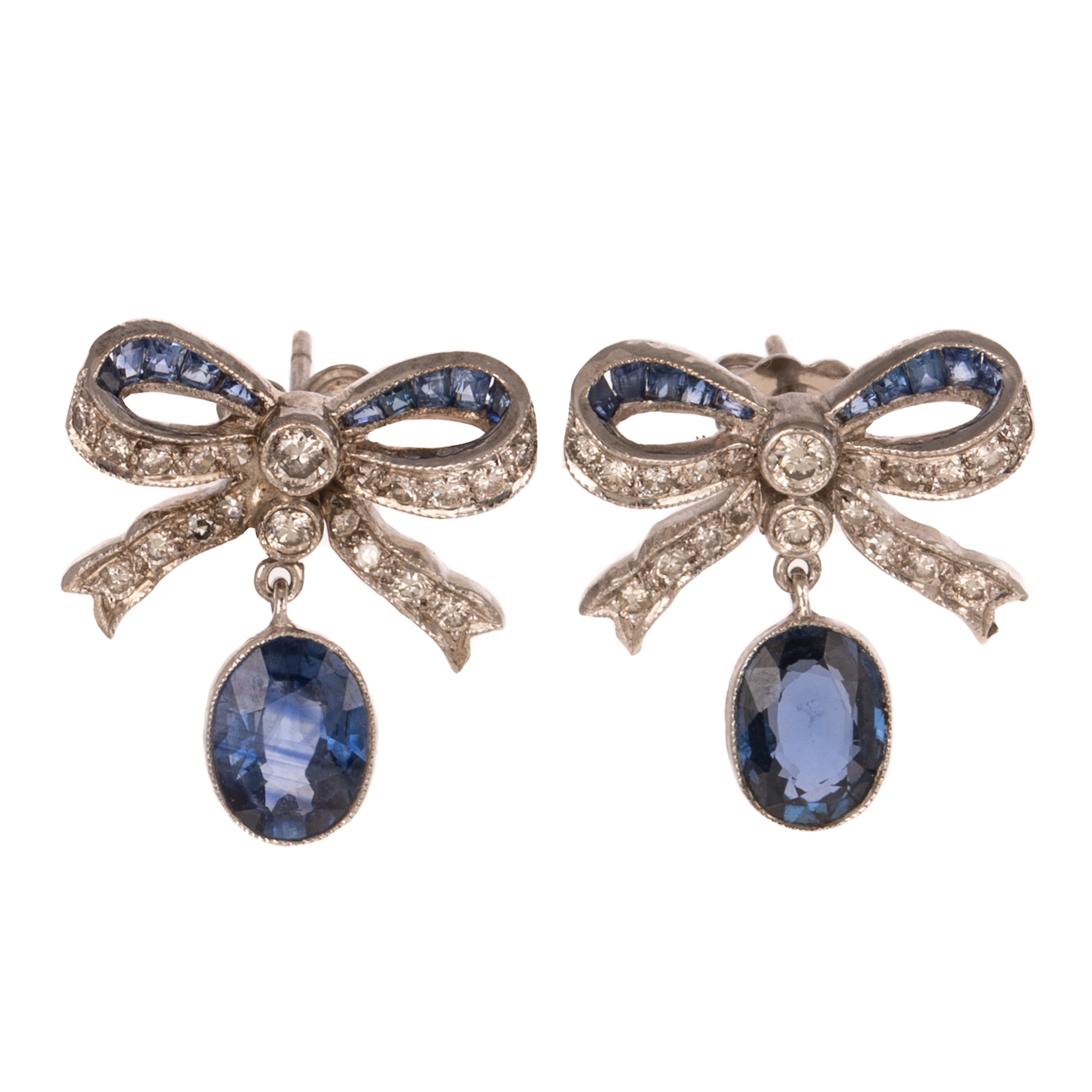 A Pair of Sapphire & Diamond Bow Earrings in Platinum