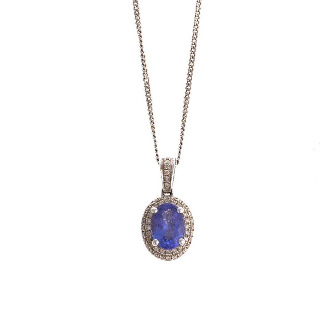 A Tanzanite & Diamond Pendant & Chain in 14K