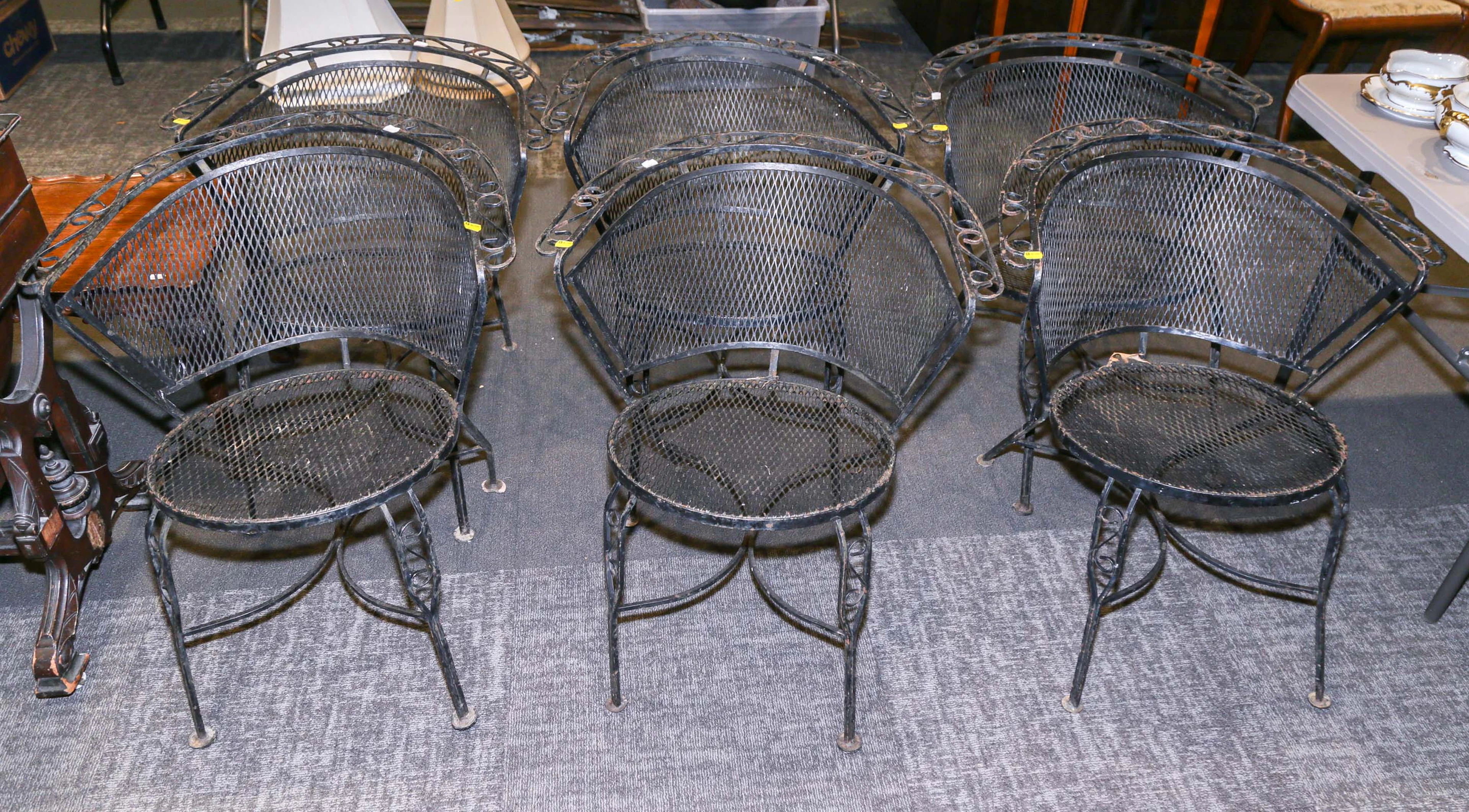 Six Wrought Iron Patio Armchairs