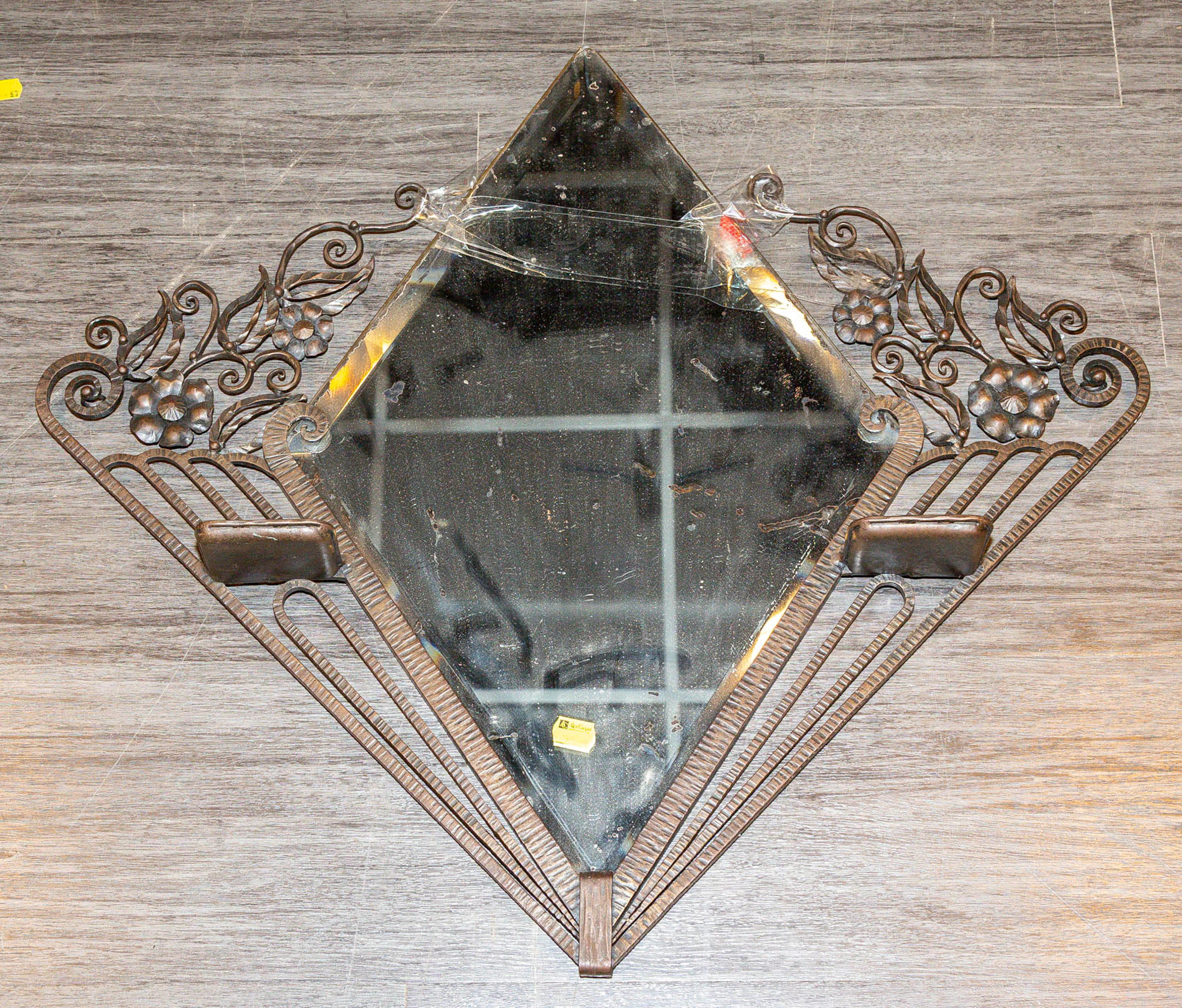 An Art Deco Wrought Iron Mirror